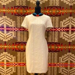 White fitted dress with embroidery details 🤍